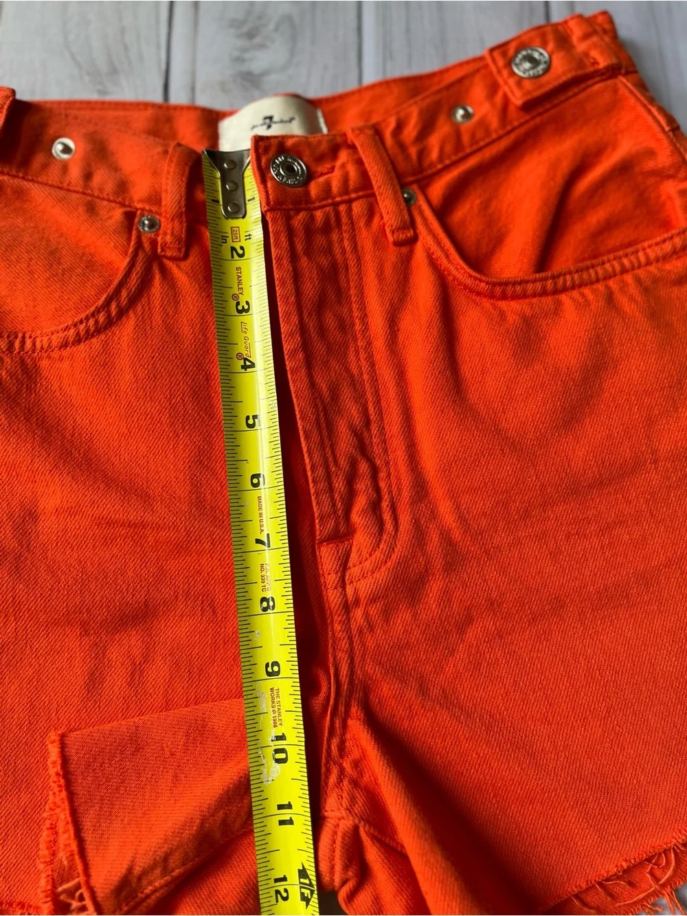 Women’s 7 for all Mankind Easy Ruby Orange raw hem button fly Jean short.Size 26